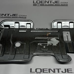 Hitteschild uitlaat over de achtersilencer